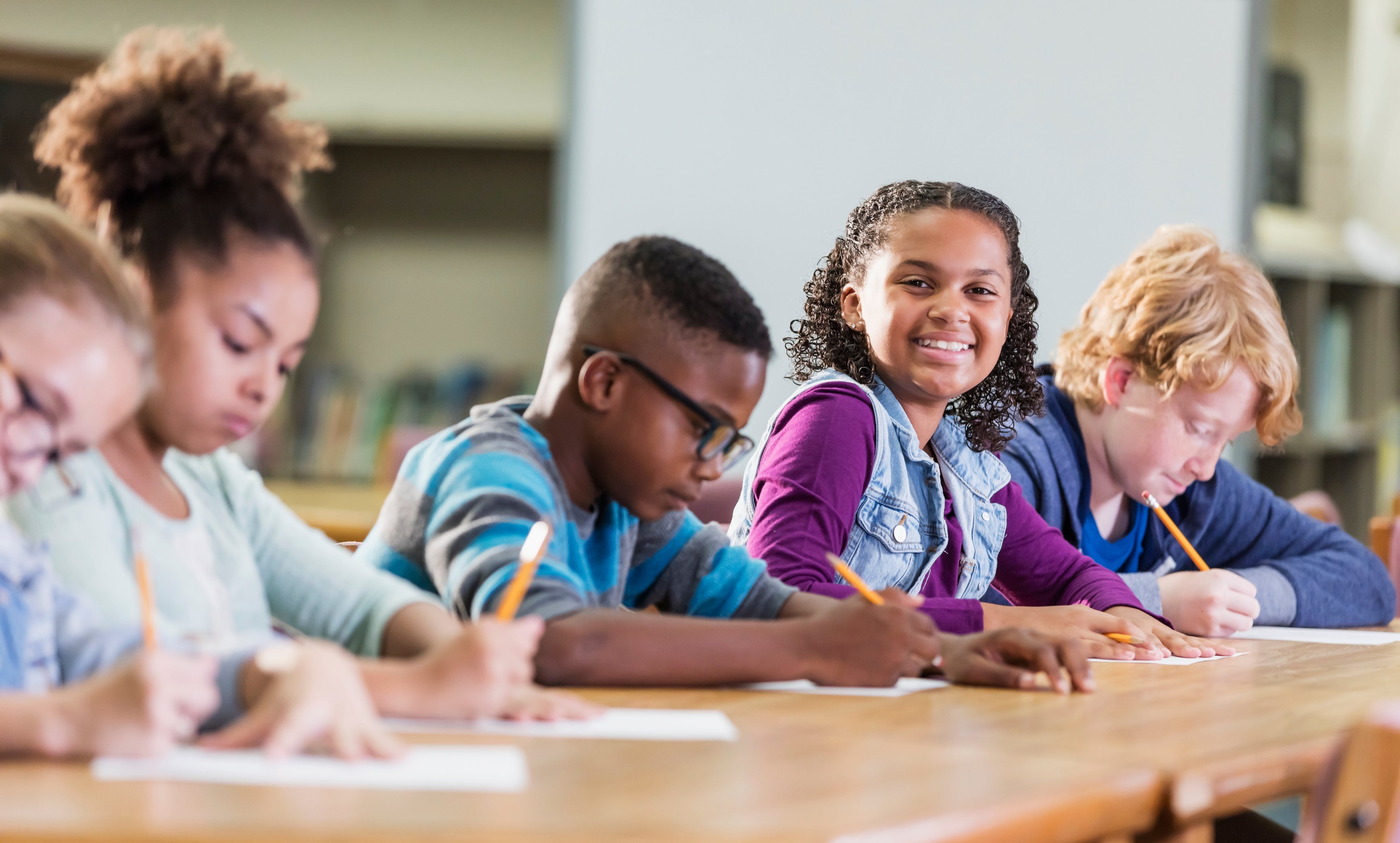 Elementary school students taking a test